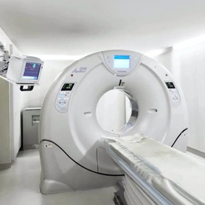 High-tech MRI scanner and Spiral CT scan machine in modern hospital radiology suite